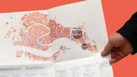 Illustration: Hand hält einen Stadtplan von Venedig